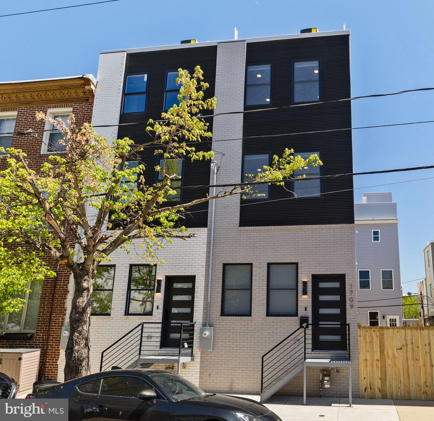 1709 North 4th Street Philadelphia, PA 19122 - Photo 2 of 50 front view of a building with potted plants