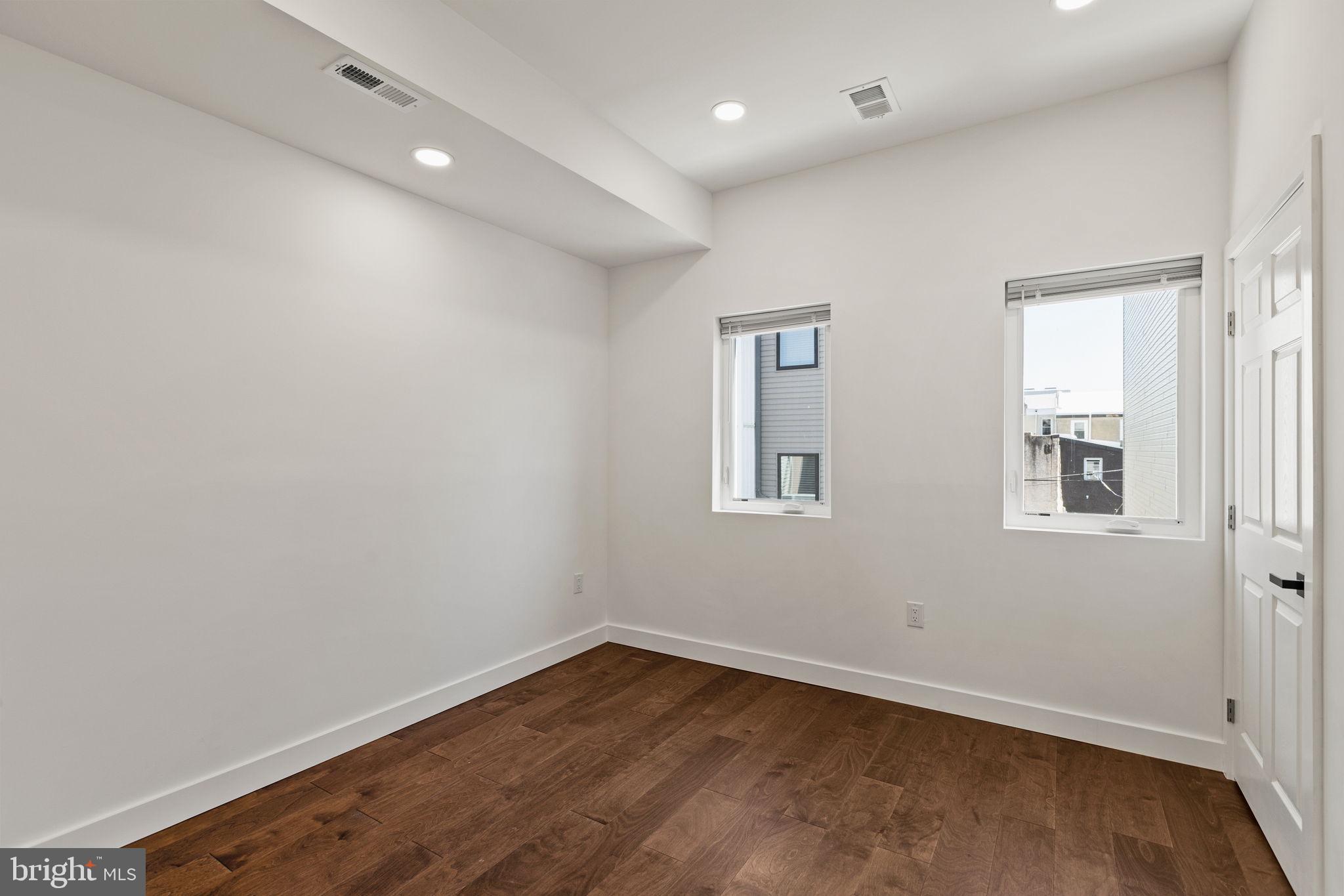 1709 North 4th Street Philadelphia, PA 19122 - Photo 26 of 50 wooden floor in an empty room with a window