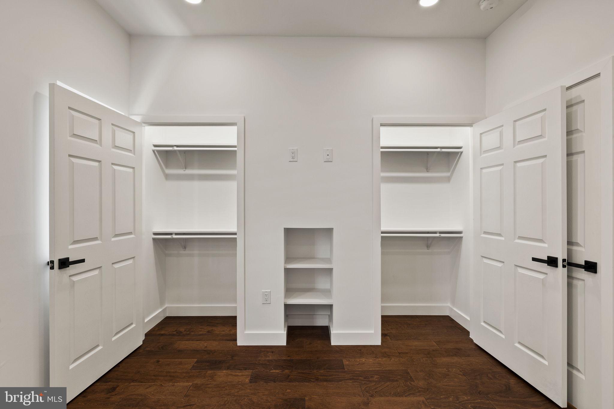 1709 North 4th Street Philadelphia, PA 19122 - Photo 29 of 50 a view of walk in closet with wooden floor and window