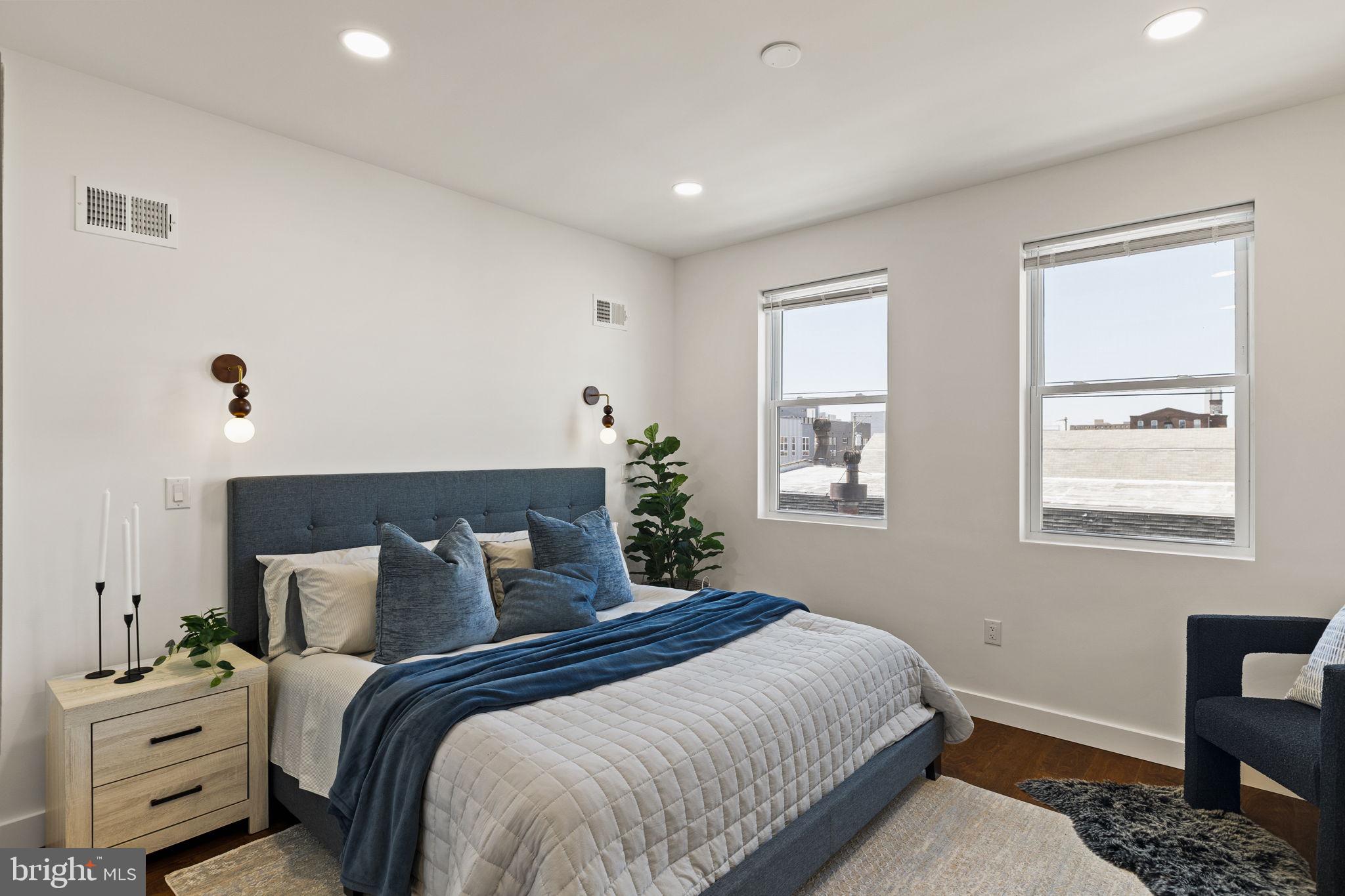 1709 North 4th Street Philadelphia, PA 19122 - Photo 31 of 50 a bedroom with a bed and a window