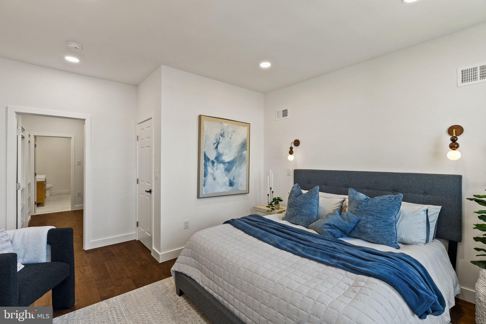 1709 North 4th Street Philadelphia, PA 19122 - Photo 33 of 50 a bedroom with bed and wooden floor