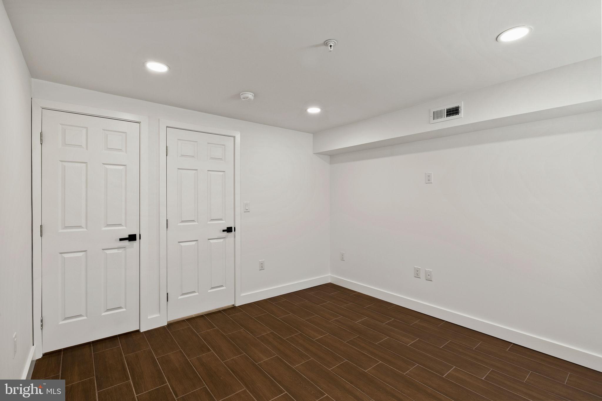 1709 North 4th Street Philadelphia, PA 19122 - Photo 49 of 50 a view of an empty room with wooden floor