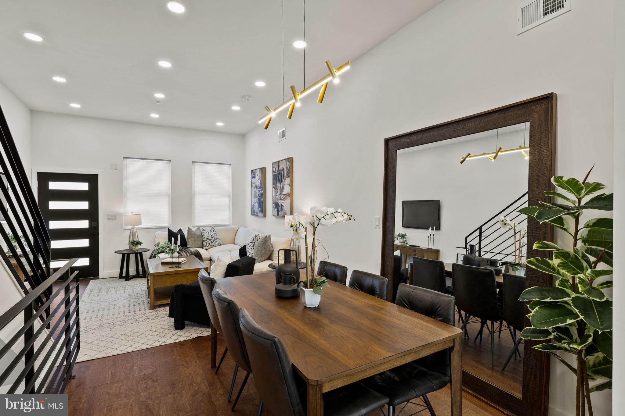1709 North 4th Street Philadelphia, PA 19122 - Photo 7 of 50 a view of a dining room with furniture and wooden floor