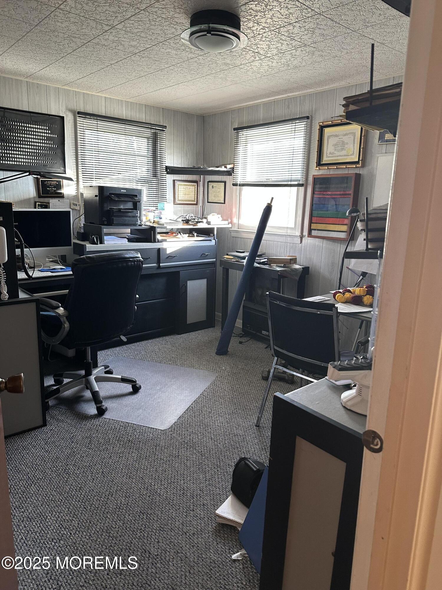 15 Georgia Tavern Road Farmingdale, NJ 07727 - Photo 13 of 17 a room with gym equipment and windows