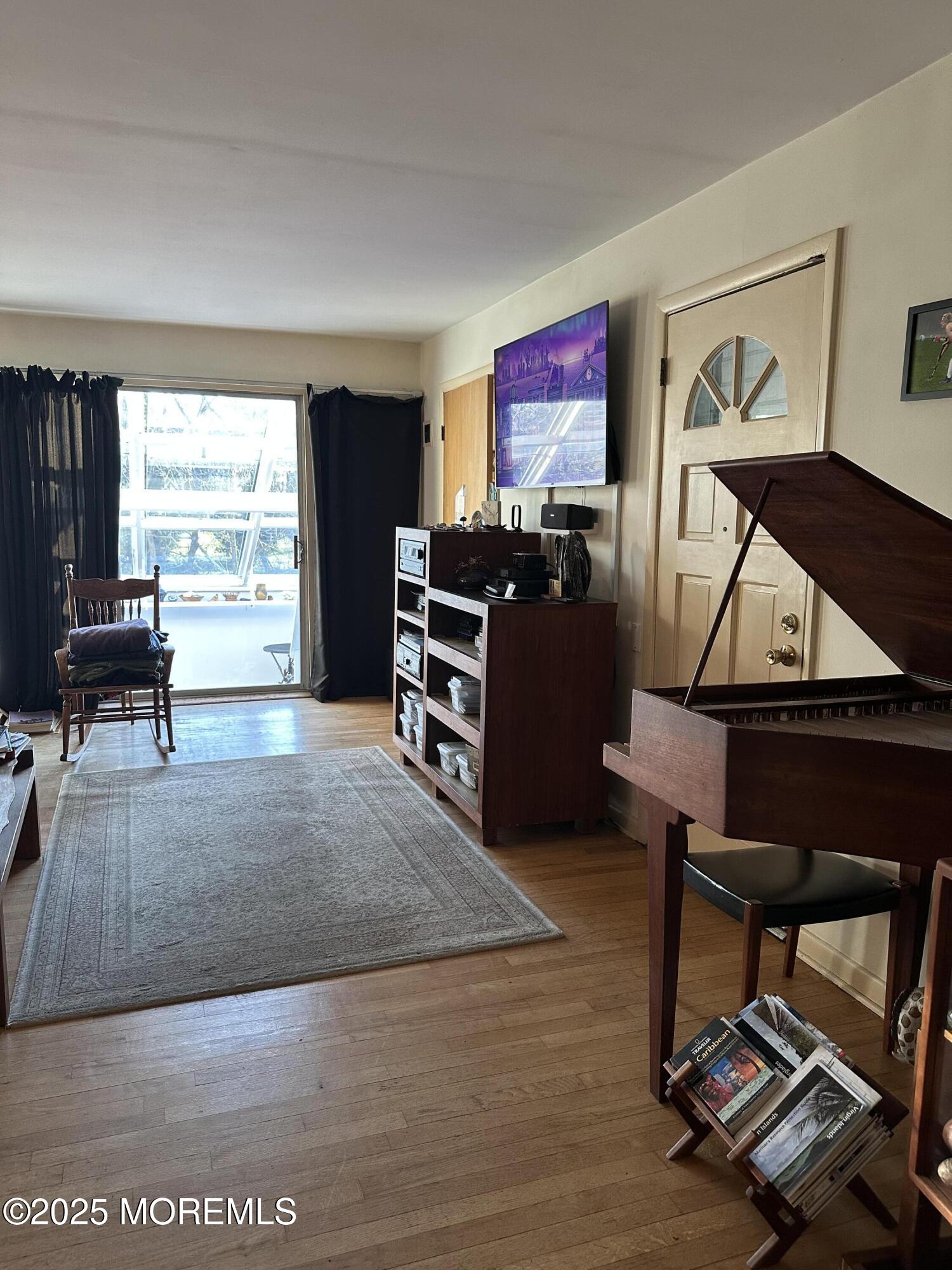 15 Georgia Tavern Road Farmingdale, NJ 07727 - Photo 4 of 17 a living room with furniture and a window