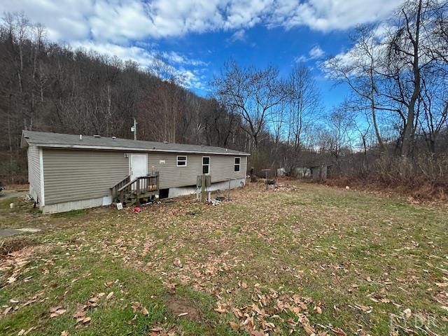 1959 Sweet Hollow Road Big Island, VA 24526 - Photo 22 of 26 a view of a barn in the middle of a yard