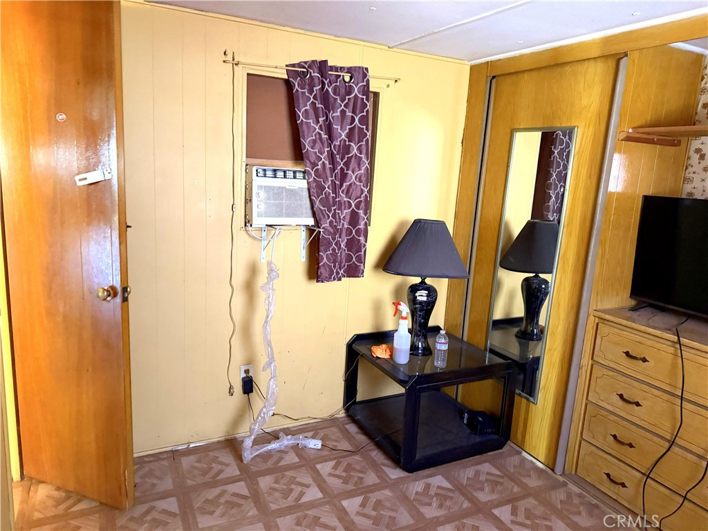 185 North Eucalyptus Avenue, Unit 53 Rialto, CA 92376 - Photo 19 of 38 a living room with furniture and a flat screen tv