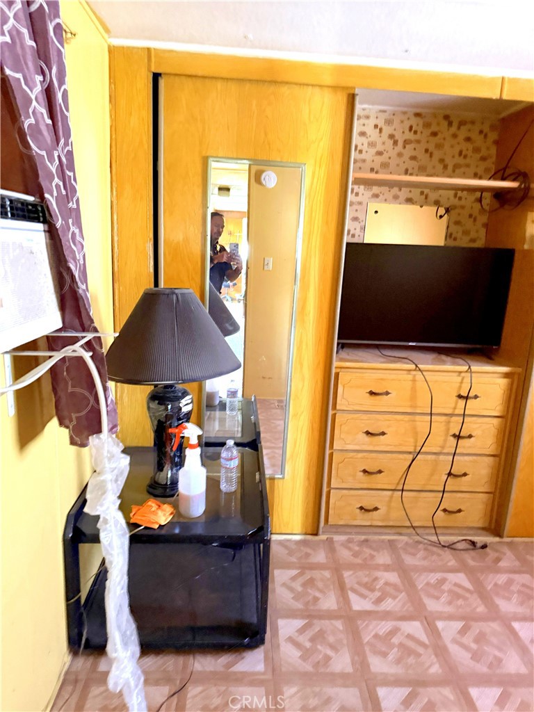 185 North Eucalyptus Avenue, Unit 53 Rialto, CA 92376 - Photo 21 of 38 a view of living room with furniture and a fireplace