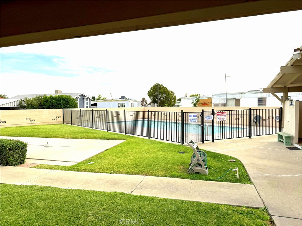 185 North Eucalyptus Avenue, Unit 53 Rialto, CA 92376 - Photo 30 of 38 a view of a backyard