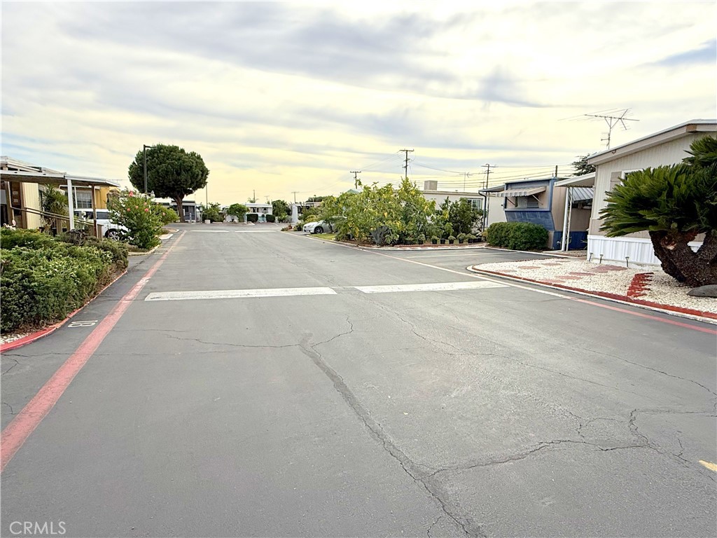 185 North Eucalyptus Avenue, Unit 53 Rialto, CA 92376 - Photo 34 of 38 a view of a city street outside a house