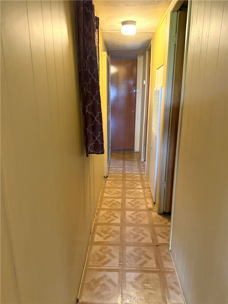185 North Eucalyptus Avenue, Unit 53 Rialto, CA 92376 - Photo 37 of 38 a view of hallway with entryway