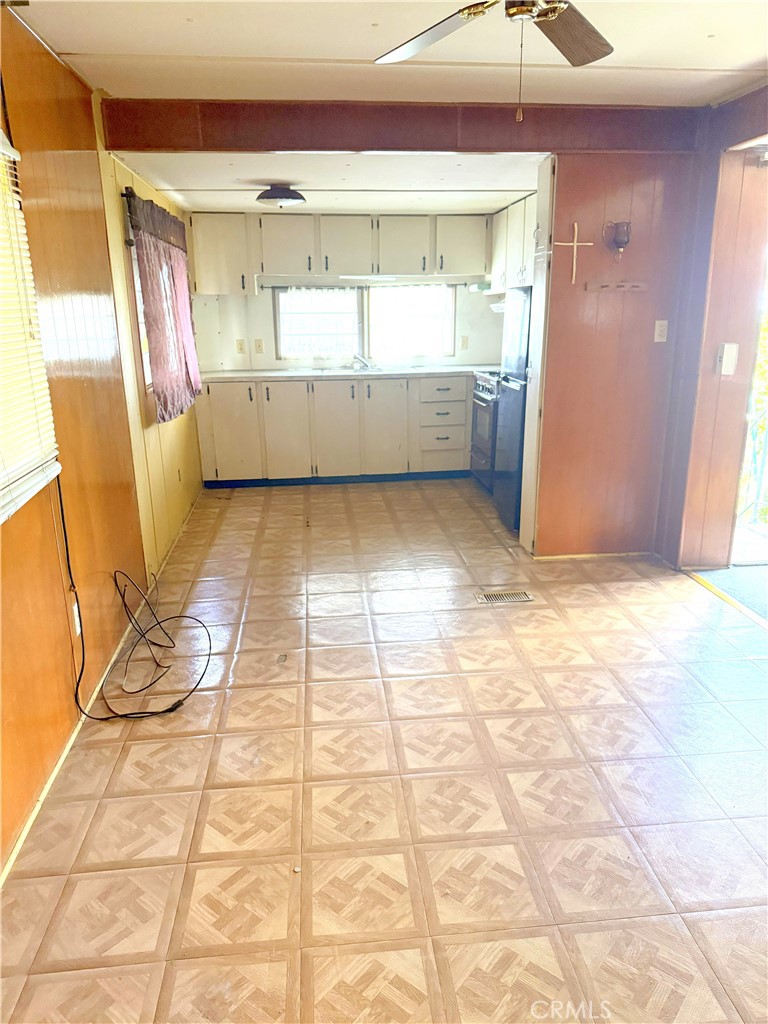 185 North Eucalyptus Avenue, Unit 53 Rialto, CA 92376 - Photo 38 of 38 a view of empty room with wooden floor and fan