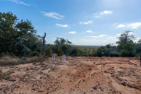a view of a road with trees