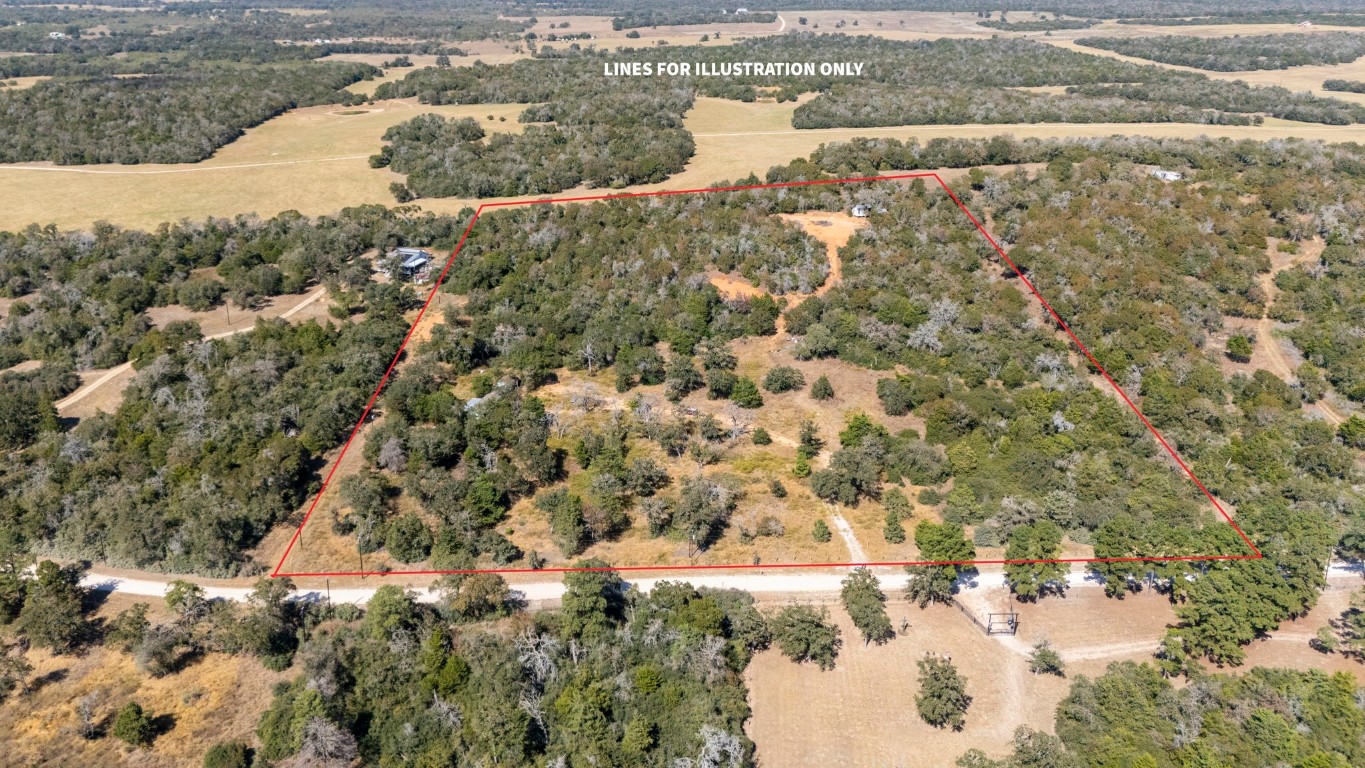 3115 Chuckwagon Road Luling, TX 78648 - Photo 6 of 25 a view of lake with houses