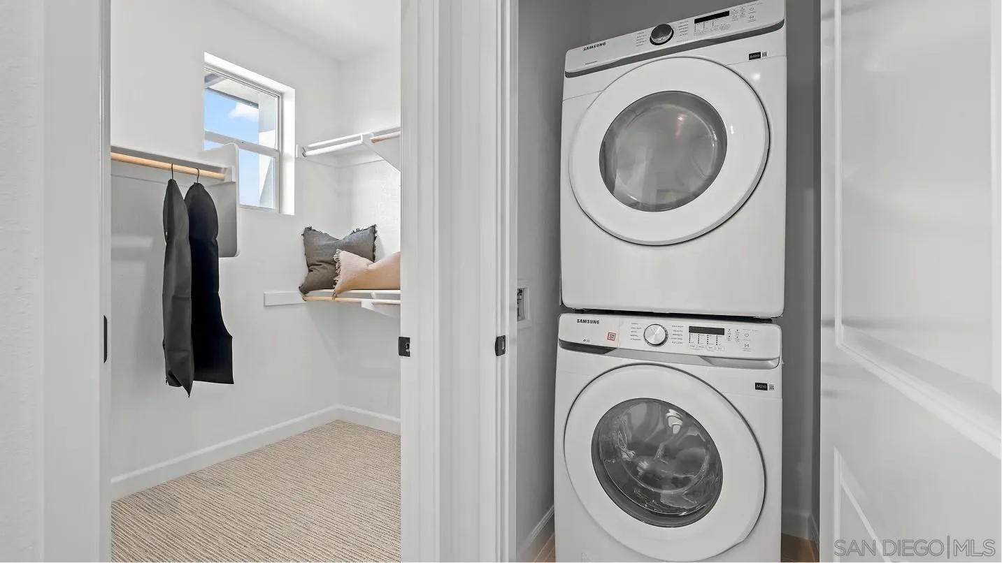 322 Honeysuckle Way Oceanside, CA 92057 - Photo 11 of 12 a utility room with dryer and washer