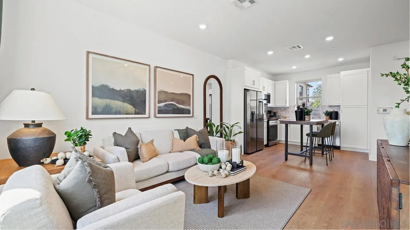 322 Honeysuckle Way Oceanside, CA 92057 - Photo 2 of 12 a living room with furniture and a table