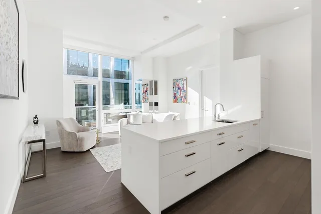 a bathroom with a double vanity sink and mirror
