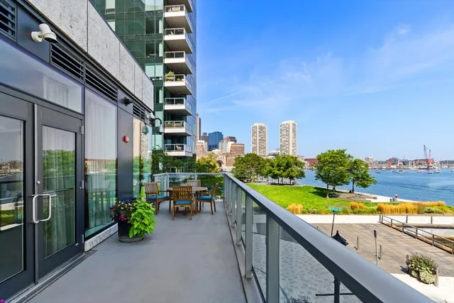 a view of swimming pool from a balcony