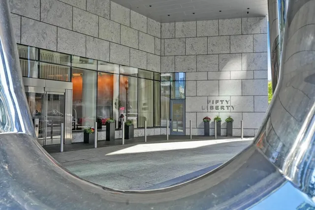 a view of a city with tall buildings