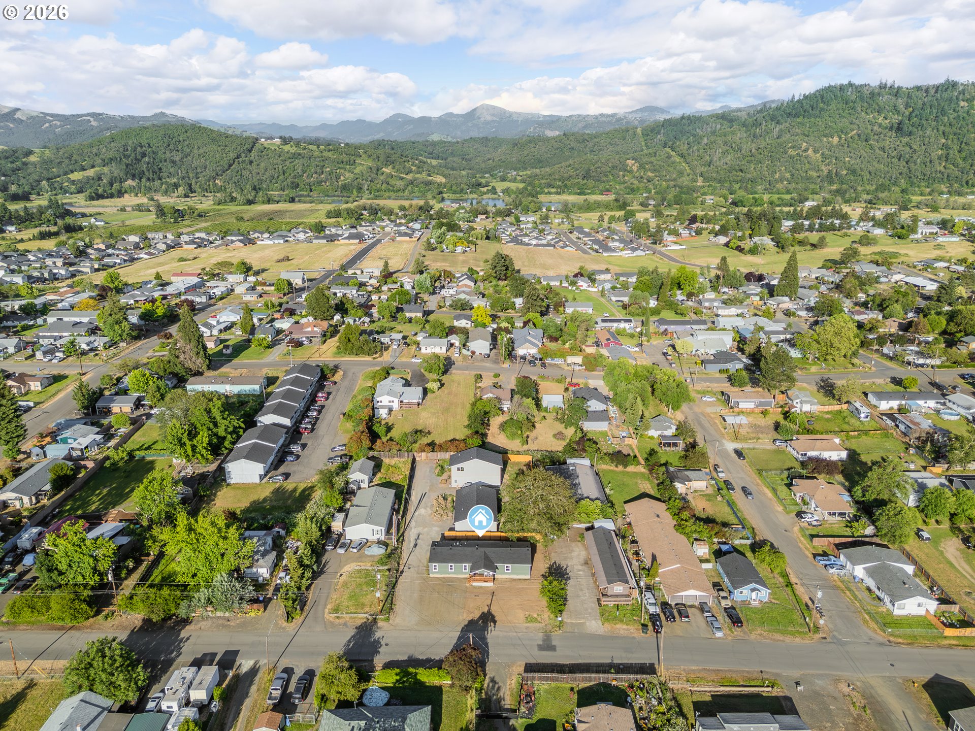 70 Darrell Avenue Winston, OR 97496 - Photo 35 of 39 an aerial view of residential houses with outdoor space and street view