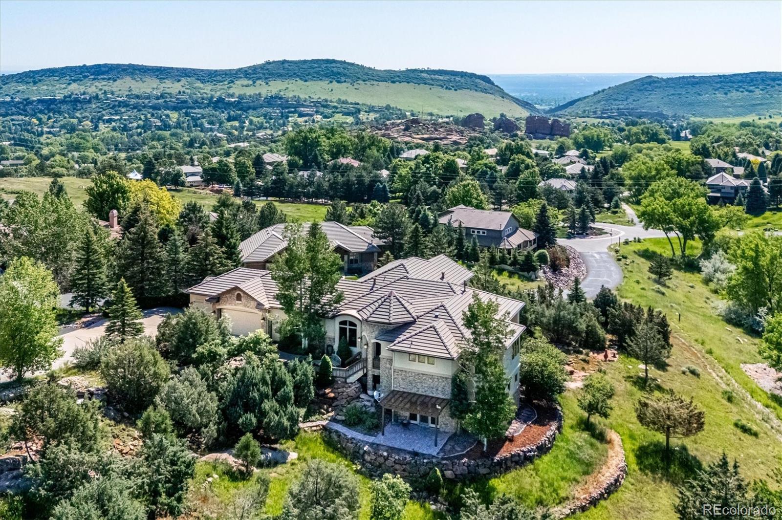 16134 Sandstone Drive Morrison, CO 80465 - Photo 25 of 30 an aerial view of a house with a garden