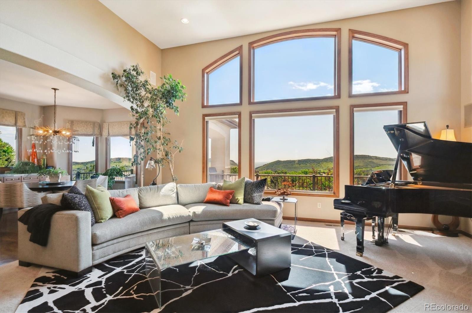 16134 Sandstone Drive Morrison, CO 80465 - Photo 3 of 30 a living room with furniture and a large window