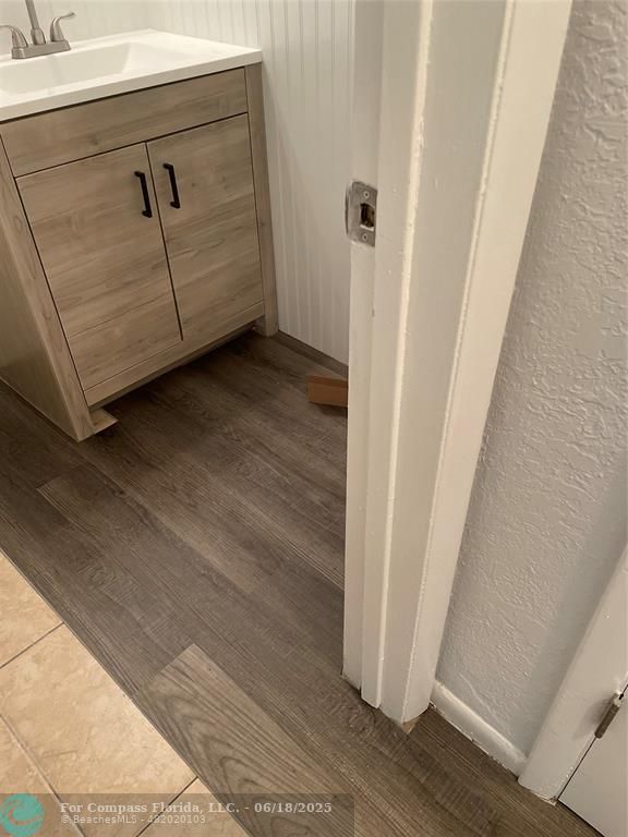 5631 Northwest 15th Street Lauderhill, FL 33313 - Photo 16 of 20 a view of room with wooden floor