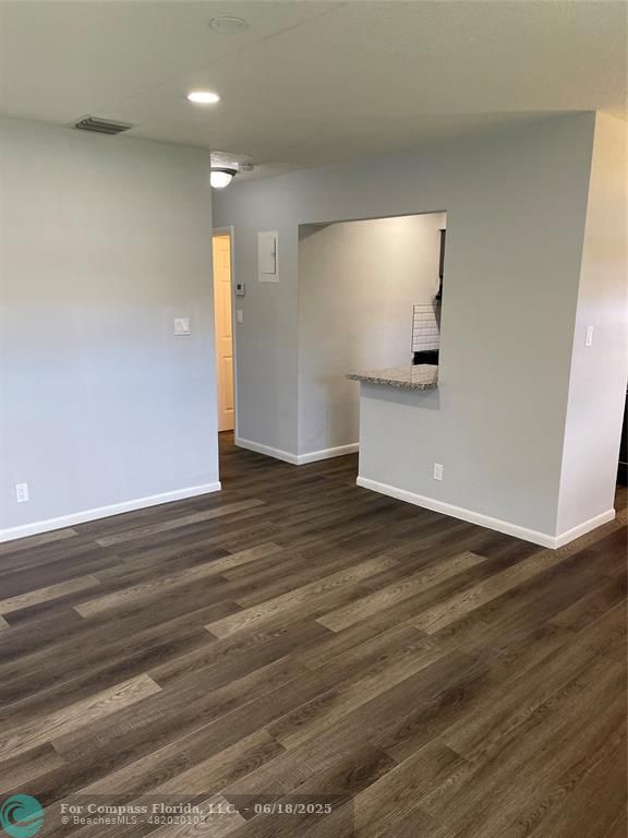 5631 Northwest 15th Street Lauderhill, FL 33313 - Photo 2 of 20 a view of empty room with wooden floor