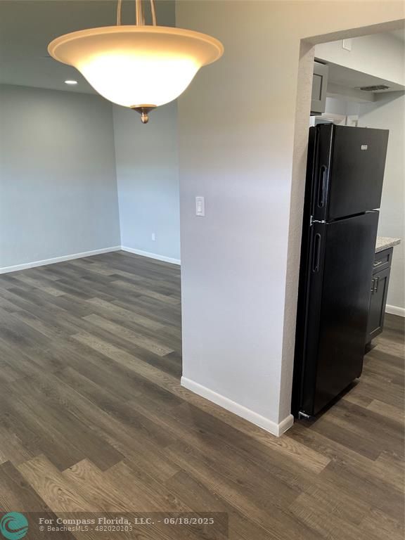 5631 Northwest 15th Street Lauderhill, FL 33313 - Photo 4 of 20 a view of empty room with wooden floor