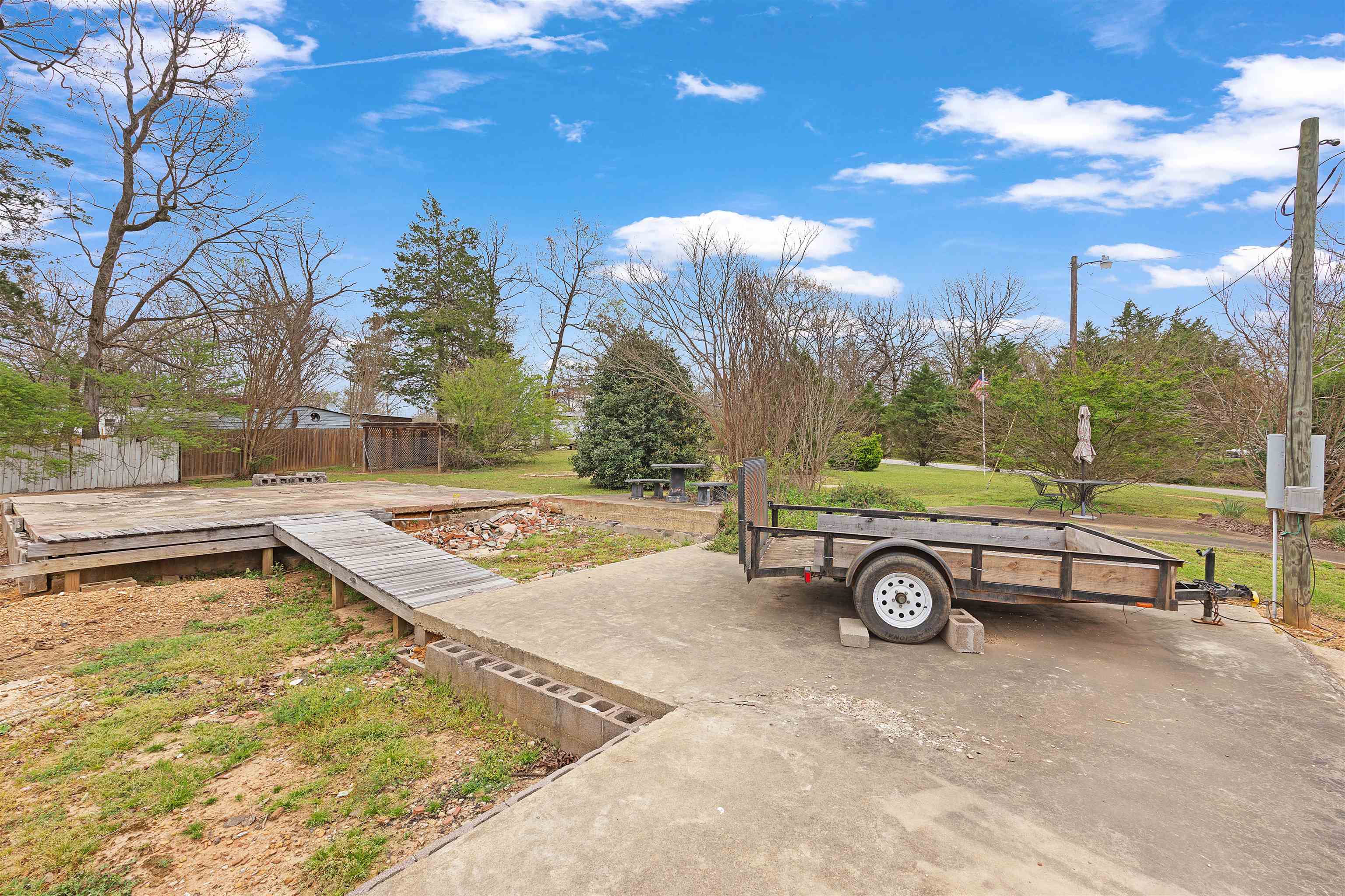 90 Rose Road Crump, TN 38327 - Photo 21 of 28 View of yard with a deck