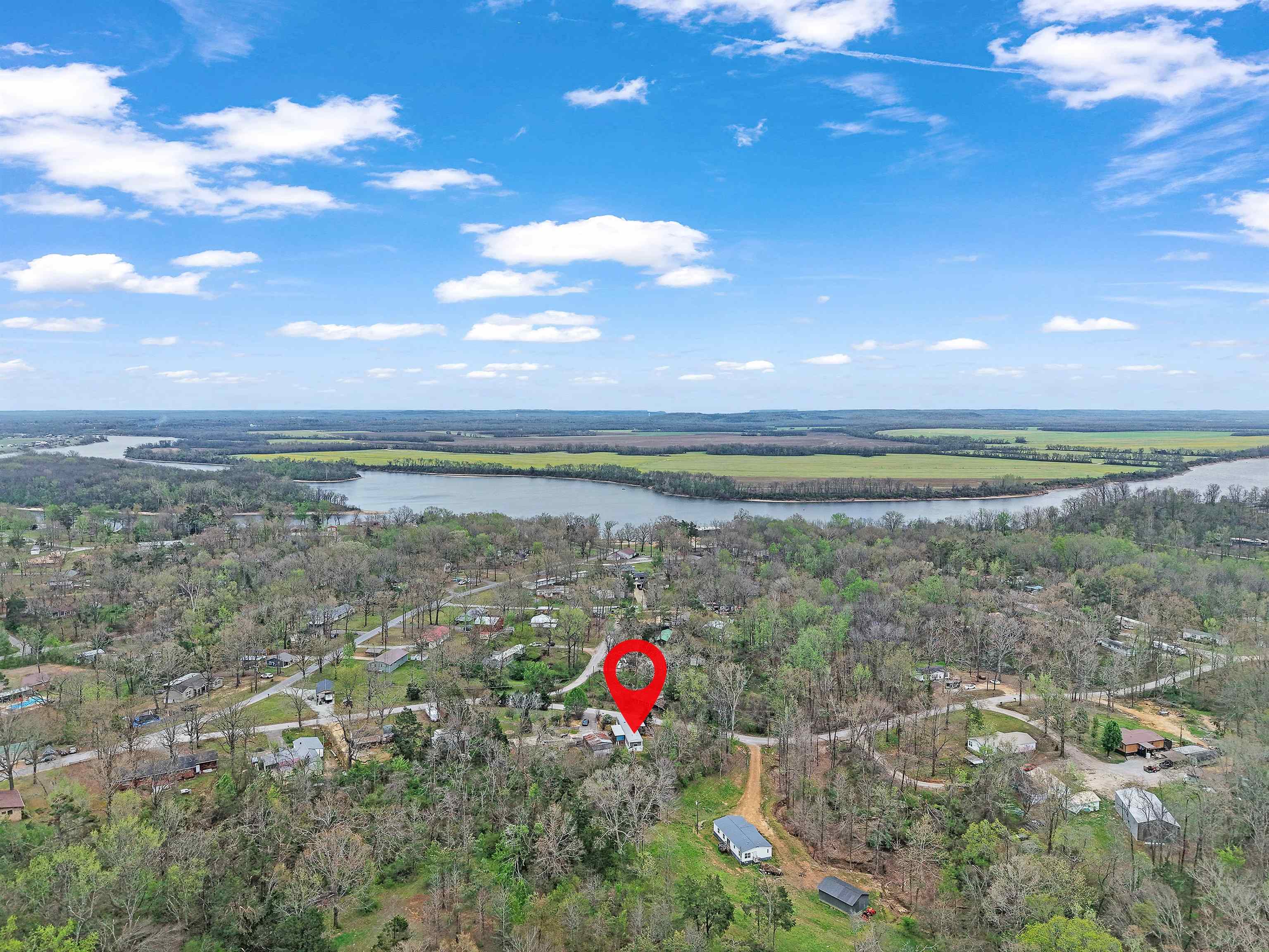 90 Rose Road Crump, TN 38327 - Photo 23 of 28 Drone / aerial view of a large body of water and a forest