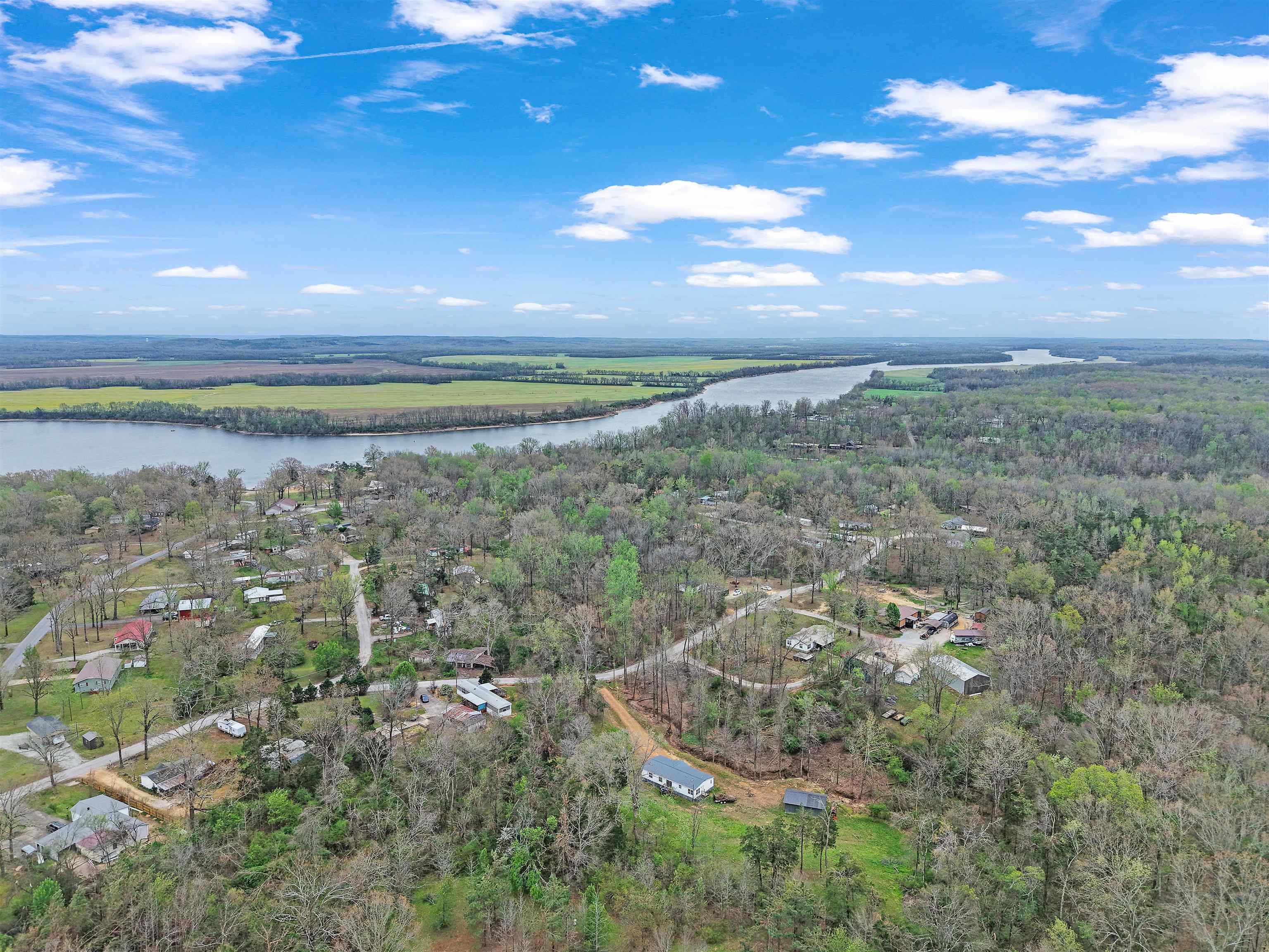 90 Rose Road Crump, TN 38327 - Photo 25 of 28 Aerial view of a large body of water and a forest