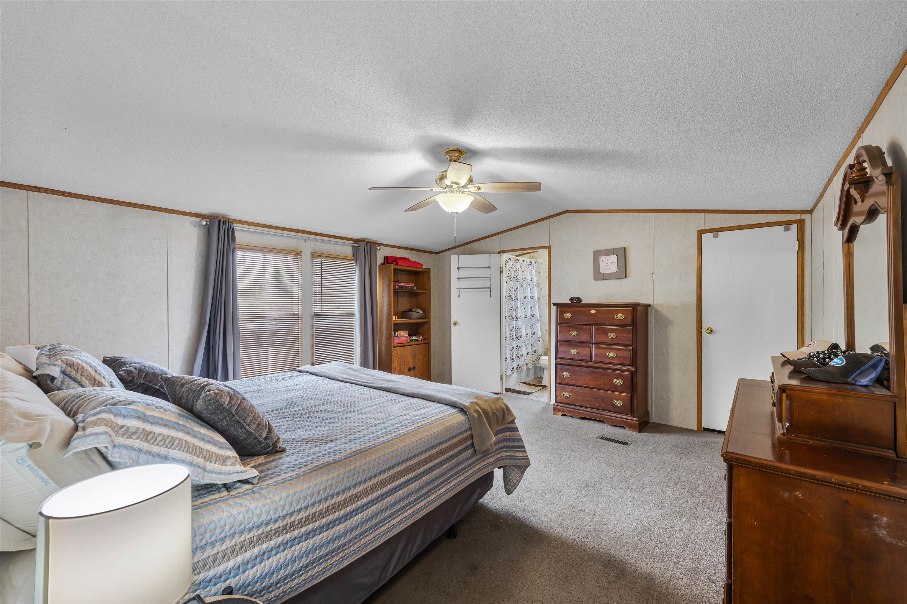 90 Rose Road Crump, TN 38327 - Photo 4 of 28 Bedroom featuring carpet and a ceiling fan