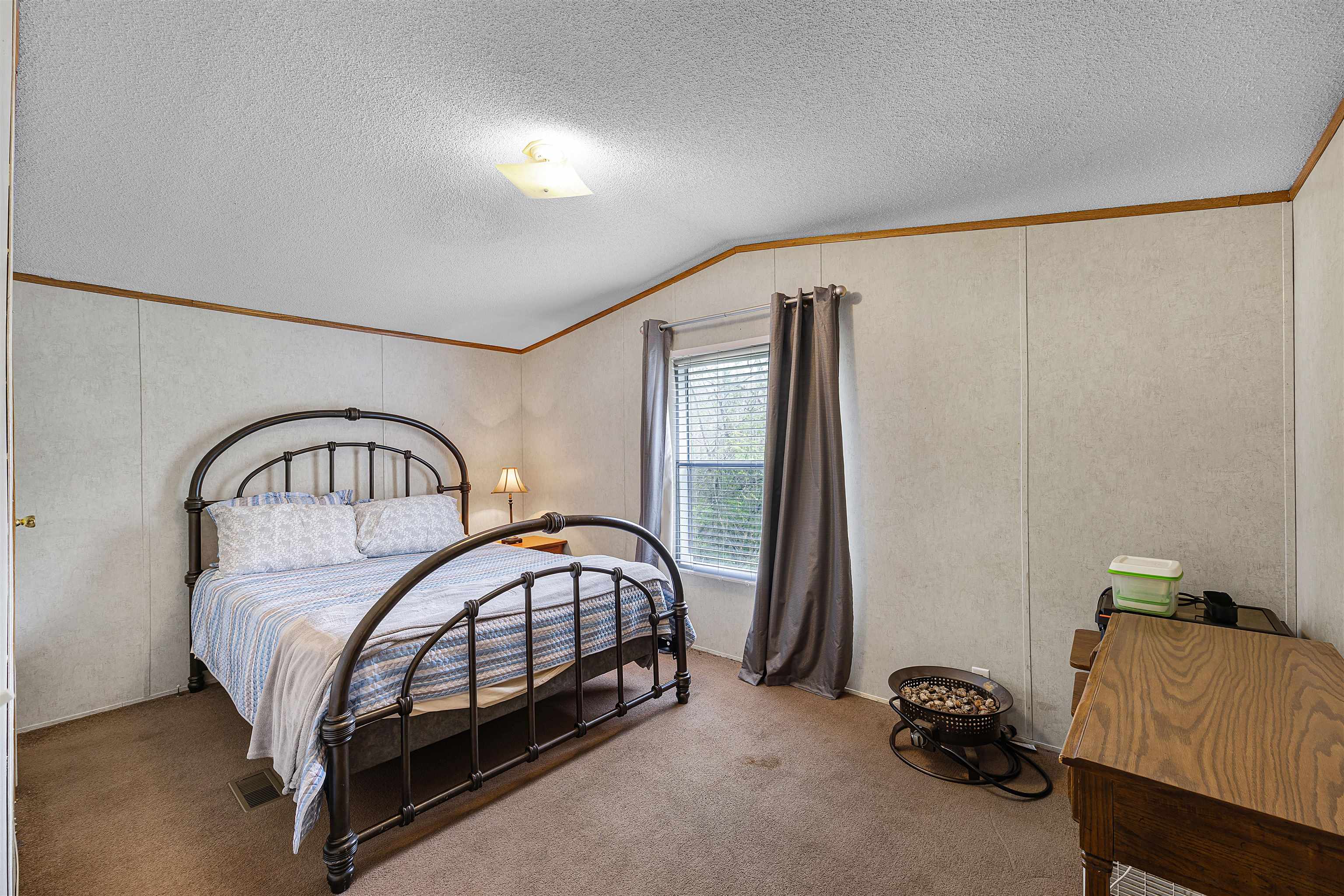 90 Rose Road Crump, TN 38327 - Photo 8 of 28 Bedroom featuring ornamental molding and carpet