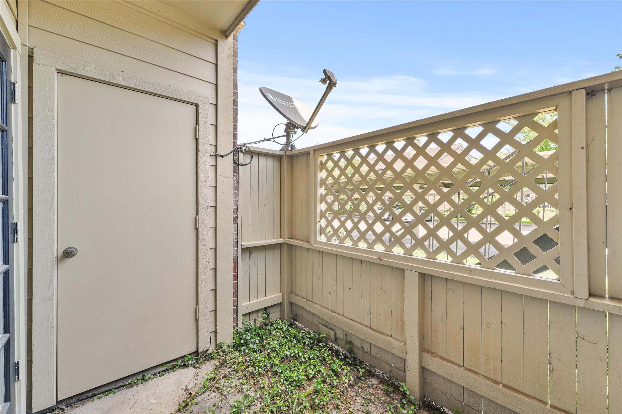 8055 Cambridge Street, Unit 21 Houston, TX 77054 - Photo 14 of 15 a wooden door in a yard