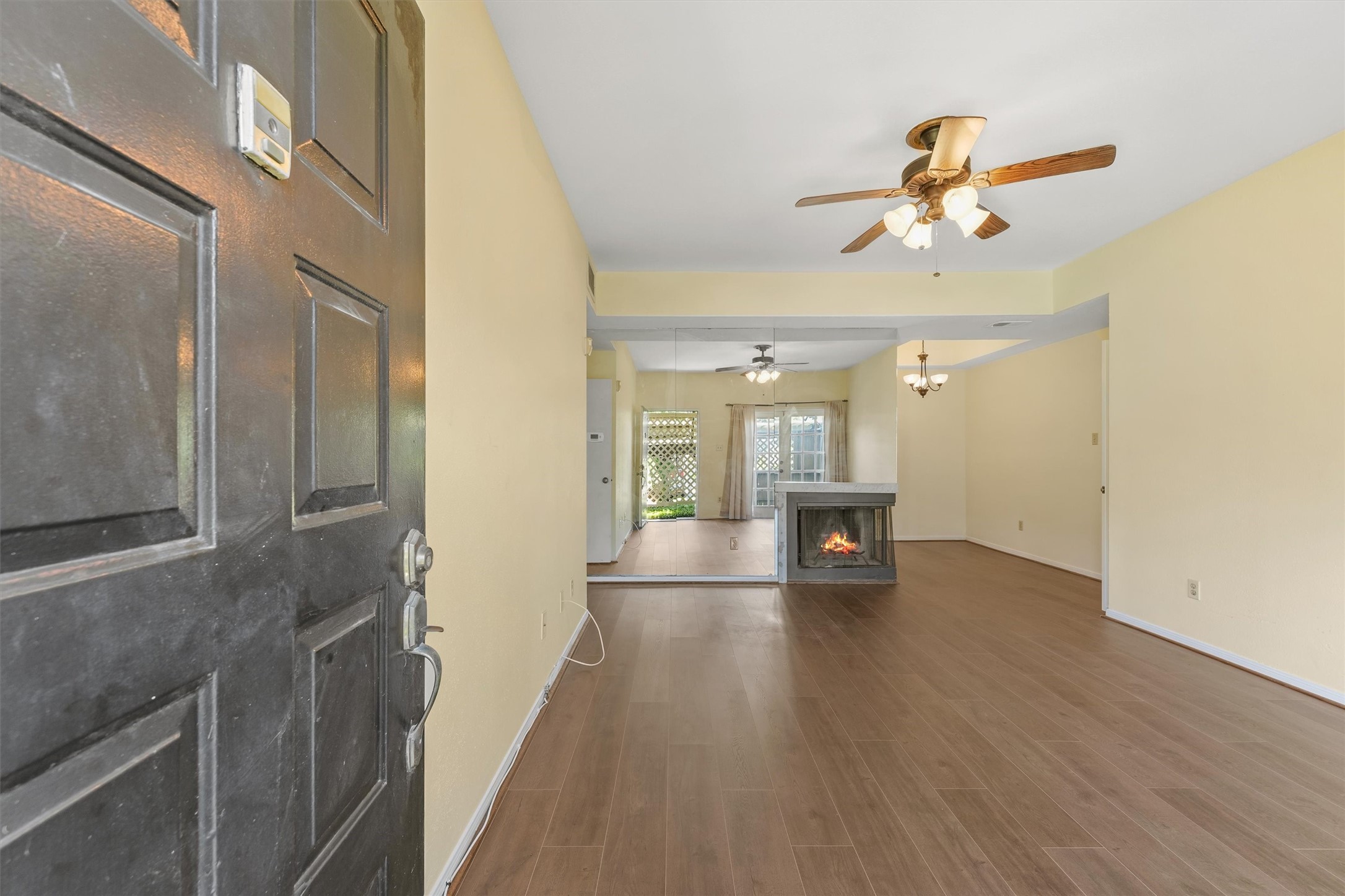 8055 Cambridge Street, Unit 21 Houston, TX 77054 - Photo 3 of 15 a view of empty room with wooden floor