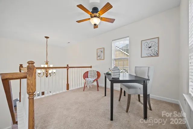 a view of a livingroom with furniture