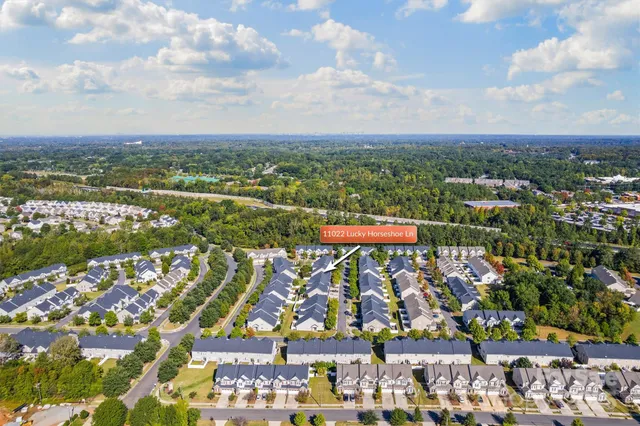 a view of a city with lots of green space