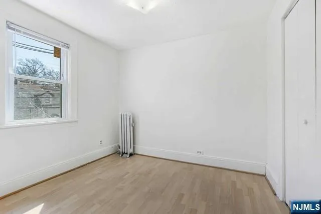 a view of an empty room with window