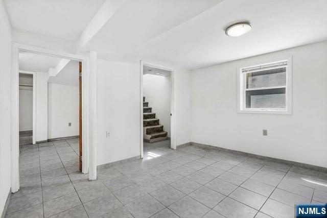 122 Spring Street Leonia, NJ 07605 - Photo 15 of 19 an empty room with windows