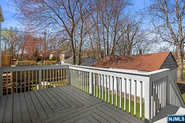 122 Spring Street Leonia, NJ 07605 - Photo 17 of 19 a view of a wooden roof deck