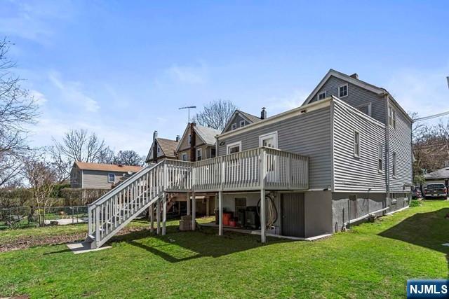 122 Spring Street Leonia, NJ 07605 - Photo 19 of 19 a view of a house with a yard and deck