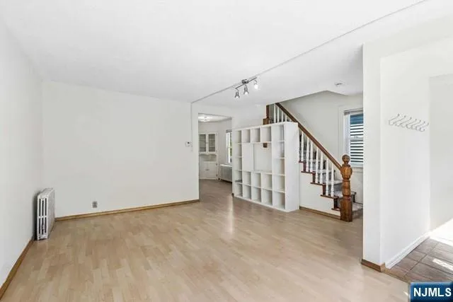 a view of a hallway with staircase