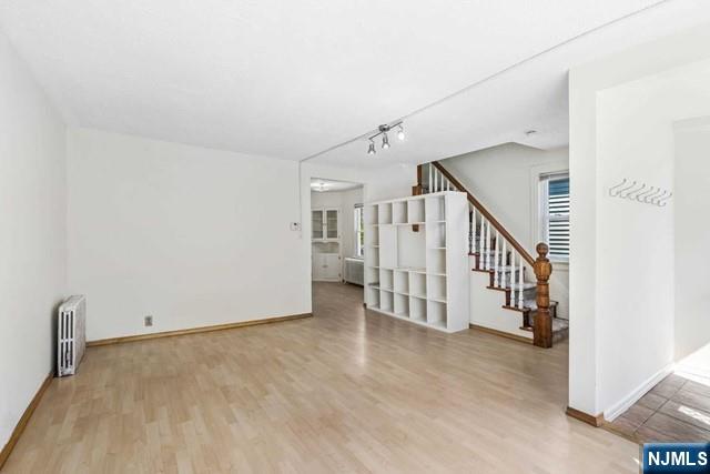 122 Spring Street Leonia, NJ 07605 - Photo 3 of 19 a view of a hallway with staircase
