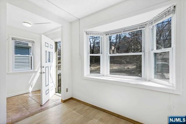 122 Spring Street Leonia, NJ 07605 - Photo 5 of 19 an empty room with a window