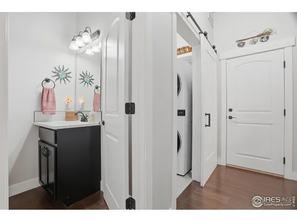 a bathroom with a sink vanity and a mirror