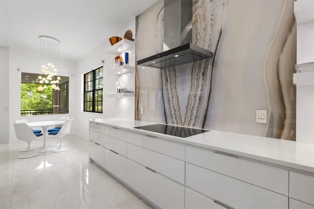 a bathroom with a sink a mirror and a window