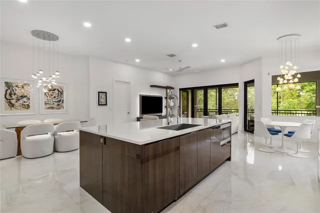 a large kitchen with a large counter top space