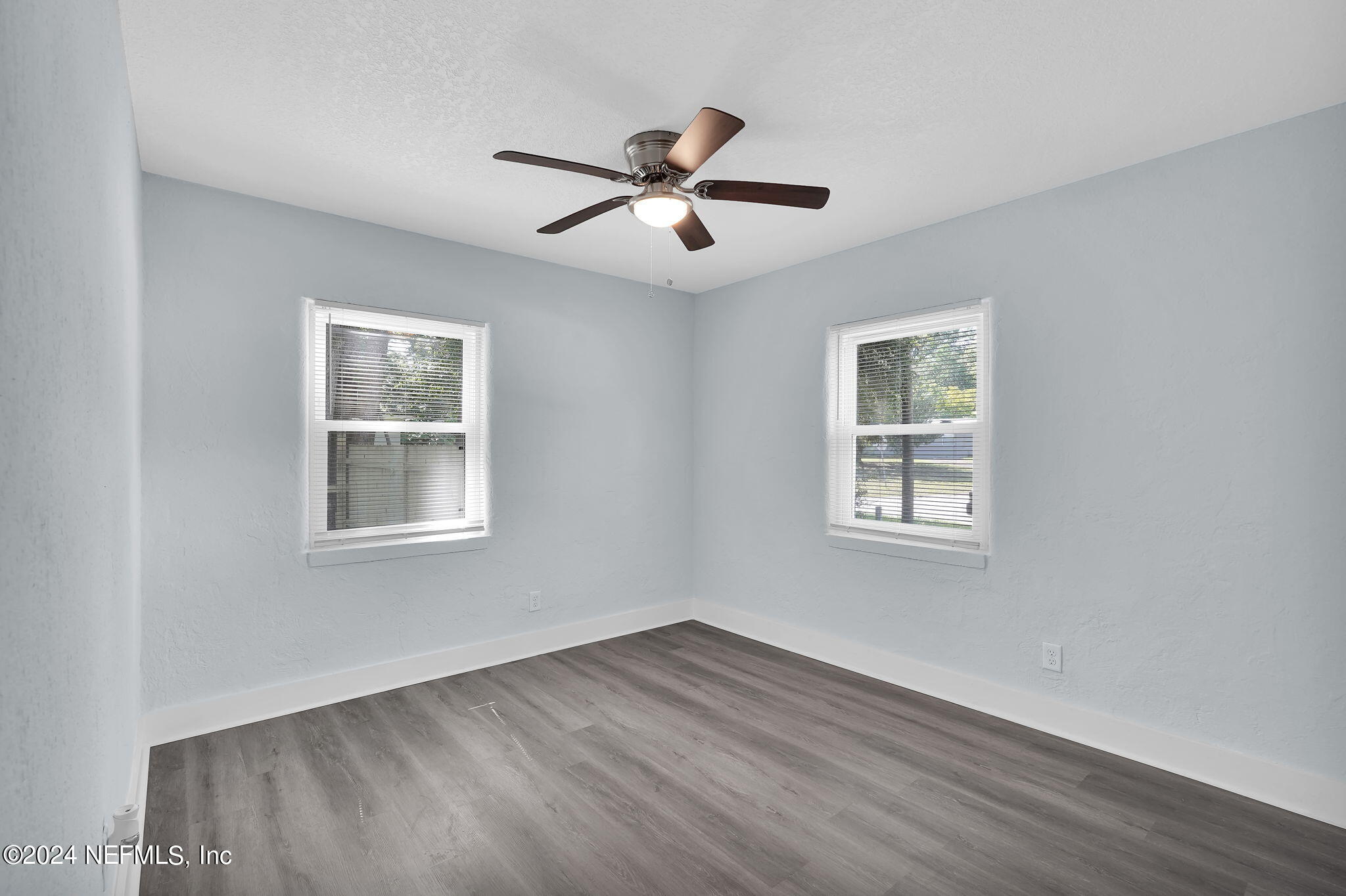 6763 Ector Road Jacksonville, FL 32211 - Photo 22 of 28 a view of empty room with wooden floor