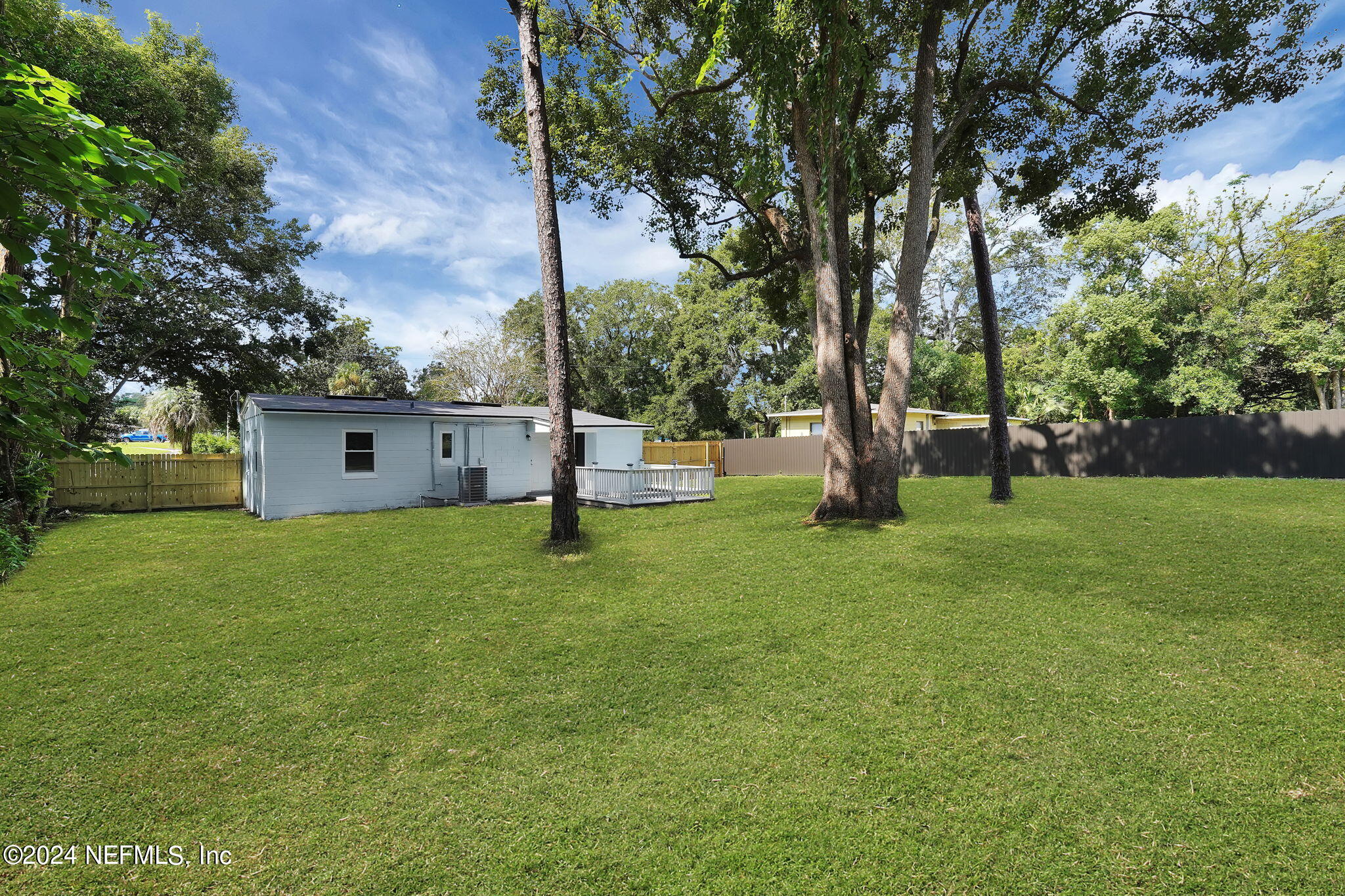 6763 Ector Road Jacksonville, FL 32211 - Photo 26 of 28 a view of a house with a backyard